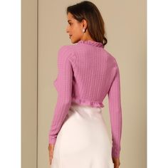 Designed in stretchy knitted fabric, it features a ruffle collar and cropped silhouette. Framed with ruffles, this cropped cardigan from Allegra K is romantic, feminine, and stylish. Paired with an elegant dress for an effortless and romantic look. Easy enough for every day, but sophisticated enough to dress up, the ruffle hem detail will bring a glamorous update. A perfect choice for a wedding, honeymoon, party, and so on. Fitted Long Sleeve Ruffle Cardigan, Spring Textured Knit Long Sleeve Crop Top, Stretch Ruffled Cropped Crop Top, Stretch Ruffled Crop Top, Stretch Crop Top With Ruffles, Spring Fitted Ruffle Cardigan, Fitted Ruffle Cardigan For Spring, Spring Fitted Textured Knit Crop Top, Fitted Textured Knit Crop Top For Spring