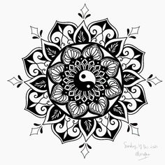 a black and white drawing of a flower