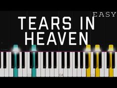 a piano keyboard with the words tears in heaven written on it and an image of yellow,