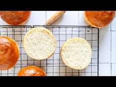 several loaves of bread on a cooling rack