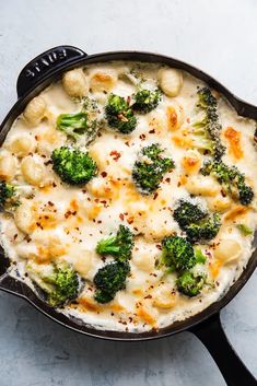 broccoli and cauliflower casserole in a cast iron skillet