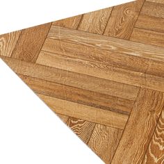 an image of wood flooring that looks like herringbones