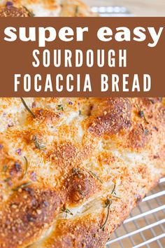 a close up of a piece of bread on a cooling rack with the words super easy sourdough focaccia bread