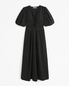 Elevate your wardrobe with the Abercrombie & Fitch Women's Tie-Front Textured Maxi Dress, a perfect blend of elegance and comfort. This dress features:

- Size: XXS
- Color: Black
- Material: Polyester, Elastane
- Gender: Female

Designed for the modern woman, this flowy maxi dress is crafted from soft textured seersucker fabric that ensures both comfort and style. The on-trend puff sleeves and plunging V-neckline add a touch of sophistication, while the keyhole cinch detail with a functional ti Textured Maxi Dress, Tie Waist Maxi Dress, Abercrombie And Fitch Dresses, Summer Wardrobe Essentials, Summer Capsule Wardrobe, Short Sleeve Maxi Dresses, Flowy Maxi Dress, Womens Tie, Womens Black Dress