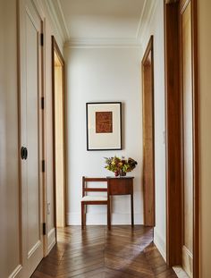 the hallway is clean and ready for us to use as an entrance way in this home