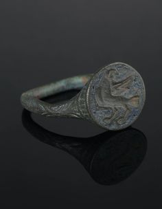 Genuine Medieval Bronze Ring by AntiqueJewls. Beard Ancient Signet Ring with Blue Enamel | Vintage Jewelry | Proud Bird Bronze Ring | Authentic Artifact. All the rings on offer are hand-picked pieces for sale with a great look, very good quality and absolute authenticity. Great signet ring from the 1400-1600s Bronze, Patina, Enamel. Vintage from before 1700. Ancient Ceremonial Round Rings, Medieval Engraved Round Rings, Ancient Intaglio Ring Jewelry, Engraved Medieval Rings, Ancient Intaglio Rings, Ancient Rings, Engraved Signet Ring, Bird Ring, Bird Rings