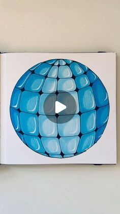 a book with an image of a blue ball on it