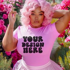 a woman with pink hair wearing a t - shirt that says your design is here