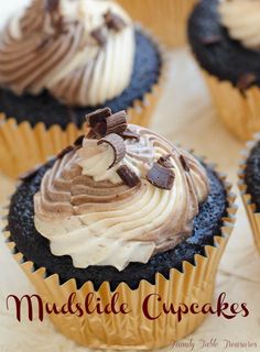 chocolate cupcakes with frosting and nuts on top