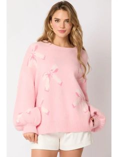 Get ready to charm everyone with our Coquette Long Balloon Sleeve Sweater! Featuring a playful bow and a fun pop of pink, this sweater is perfect for adding a touch of whimsy to any outfit. Plus, the long balloon sleeves give you a fun and trendy look while keeping you cozy and comfortable. Stay stylish and playful with our Coquette sweater. model is wearing size S Product Details: - Long Sleeve - Round Neck - Balloon sleeve Material: -47% Polyester 35% Acrylic 3% Spandex Sizing: S: 6-8 M: 10-12 Long Sleeve Fall Sweater With Bow, Long Sleeve Sweater With Bow For Fall, Fall Sweater With Bow And Long Sleeves, Playful Pink Loungewear Sweater, Spring Long Sleeve Sweater With Bow, Long Sleeve Sweater With Bow For Spring, Casual Long Sleeve Bow Sweater, Casual Long Sleeve Sweater With Bow, Feminine Bow Top For Fall