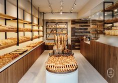 a bakery filled with lots of bread and pastries