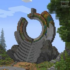 an image of a very large structure made out of rocks and trees in minecraft