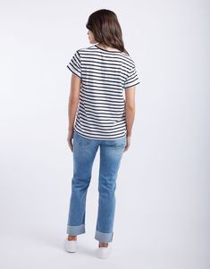 DESCRIPTION Add a touch of classic style to your wardrobe with the Turn Back Vee Neck T-Shirt in White/Black Stripe by White & Co. The Label. This timeless striped tee features a flattering V-neckline and a relaxed fit, perfect for everyday wear. The turn back cuffs add a chic detail that elevates the overall look, making it a versatile piece for any outfit. Whether you’re layering it under a jacket or wearing it on its own, this T-shirt promises both comfort and style. Pair this striped tee with blue jeans and white sneakers for a laid-back, casual look. For a more polished outfit, tuck it into a black midi skirt and add some bold accessories. This T-shirt is ideal for creating effortlessly stylish look for any occasion. Still browsing? Discover our full range of women's clothing. FEATURE Classic Short Sleeve Tops With Striped Hem, Classic Short Sleeve Top With Striped Hem, Classic Tops With Striped Hem And Short Sleeve, Classic Crew Neck Top With Striped Hem, Classic Striped Crew Neck T-shirt, Casual Black T-shirt With Striped Collar, Casual Crew Neck T-shirt With Striped Hem, Casual T-shirt With Striped Hem And Crew Neck, Casual Black Top With Striped Hem