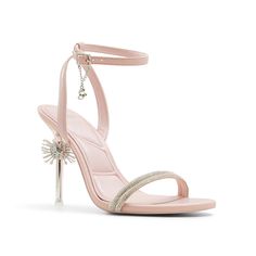 Aldo-x Wicked Spellbinding Sandal Make every moment magical with the Aldo x Wicked Spellbinding sandal. Inspired by Glinda's poppy pink, this pair is embellished with radiant rhinestone detailing, a wand as the stiletto, and a signature "G" charm on the ankle strap. Pillow Walk technology ensures superior comfort with dual density foam and padded insoles. Diamond Heels, Crystal Shoes, Sneaker Dress Shoes, Aldo Shoes, Dress Sandals, Dress With Sneakers, Ankle Strap Sandals, Strap Sandals, Shoe Brands