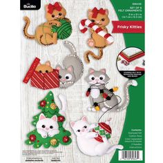 the crafty kit includes several felt animals and christmas decorations, including one cat with a hat