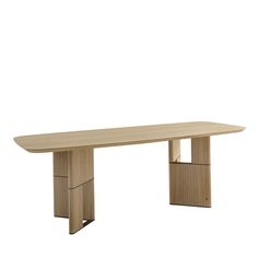 a wooden table sitting on top of a white floor