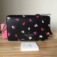 100% Authentic Kate Spade Staci Ditsy Buds Small Flap Crossbody Black Multi And Gold Hardware Brand New With Tags 7.5” L X 5” H X 2” D Adjustable Strap Kate Spade Black Spring Bag, Kate Spade Black Bags For Spring, Kate Spade Staci, Bow Purse, Kate Spade Crossbody Purse, Pattern Purse, Bags Kate Spade, Monogram Bag, Kate Spade Purse