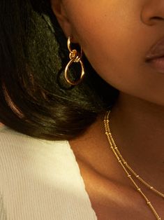 Is our favorite piece to stack with any of our necklaces. It is so simple and since it is doubled, it gives you two chains in one. We love pairing THE EMINA with chains like THE VICKY. or any other chain in our collection. Dimensions: inner layer 15” outer layer 18” Our jewelry is plated with 18k gold and brass. All our jewelry is made to last, but visit our care page for more information. Infinity Earrings, Bodysuit Tops, Double Chain, Brass Jewelry, Simple Art, Dainty Jewelry, The Chic, Simple Style, The Label