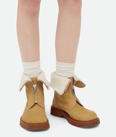 Bottega Veneta® Women's Haddock Ankle Boot in Ochre/popcorn. Shop online now. Popcorn Shop, Knitwear Dress, Fragrance Collection, Leather Collar, Denim Trousers