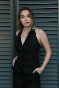 Add elegance to your wardrobe with this stylish black linen waistcoat, perfect for any season. - Material: Made of double linen fabric, which provides strength and comfort. Closed seams give the product a neat look. - Design:  - The off-the-shoulder style emphasizes your femininity and adds a touch of sexiness.  - The vest fastens with buttons, which adds sophistication and functionality.  - The collar gives it a classic look, and the wrap-around design makes this vest comfortable and practical. - Length: The comfortable length makes it easy to combine the vest with different wardrobe items, such as blouses, T-shirts or dresses. This black linen vest will be a versatile addition to your look, suitable for both casual outings and evening events. Create a stylish and modern look by combining Linen Waistcoat, Linen Vest, Vest Outfits, Black Linen, Womens Vest, Classic Looks, Festival Season, Linen Fabric, Favorite Outfit