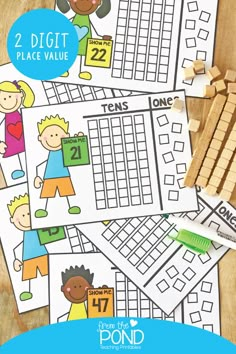 two printable place value cards with wooden pegs and clothes pins on top of them