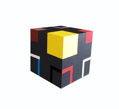 a cube made out of different colored blocks