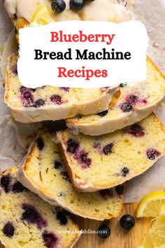 blueberry bread machine recipe with lemons and blueberries on top, next to sliced loaf of bread