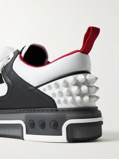 Following suit of the '90s basketball styles that inspired them, Christian Louboutin's 'Astroloubi' sneakers are characterised by a chunky profile and panelled construction. They've been made in Italy from leather and breathable mesh and embellished with signature spikes. The Maison's varsity monogram leaves no room for mistake. Louboutin Collection, 90s Basketball, Tom Ford Bag, Mesh Sneakers, Sneakers For Men, Stylish Watches, Driving Shoes, Slides Shoes, Classic Sneakers