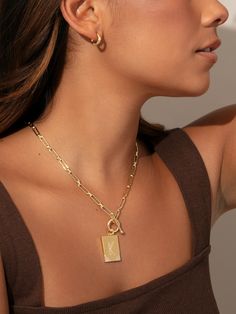 No initial necklace can make a statement quite like our Leave Your Mark Chain Necklace. Featuring a paperclip chain, toggle, and rectangle pendant, no one will forget you in this necklace. For a fully personalized look, shop our Initial Jewelry. | Leave Your Mark Chain Necklace GOLD / H Uncommon James, Leave Your Mark, Gold C, Rectangle Pendant, Gold N, Gold G, Initial Jewelry, Gold Letters, Initial Pendant