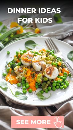 a white plate topped with green peas and scallops on top of a table