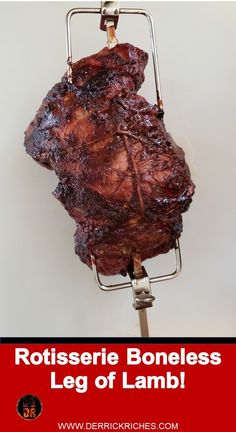 a large piece of meat sitting on top of a metal stand with the words rotissee boneless leg of lamb