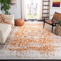 an orange and white rug in a living room