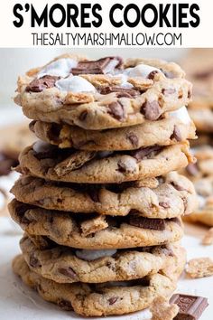 chocolate chip cookies stacked on top of each other with marshmallows in the middle