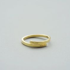 This dainty ring can be personalized with your name, coordinate, roman numeral or any inspired words. You can even make it more special by adding the birthstones. Just simply nice and minimalist to wear anytime, anywhere! PERSONALIZED BIRTHSTONE RING DETAIL * Dimension: 2mm wide * Material: 925 Sterling Siver * Color: 100% Silver, 18k Gold Plated, 18k Rosegold Filled * Max Characters: 20 characters per side * If you would like to add more birthstones than our option in drop-down list, please pur Name Rings, Stacking Bands, Birthday Ring, Twist Ring, Dainty Ring, Multi Stone Ring, Birthstone Ring, Stacking Rings, Gifts Photos