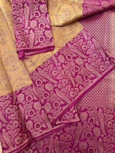 This exquisite Kanjivaram saree in a dusty moss hue is a perfect blend of tradition and elegance. The saree features intricate brocade work that adds texture and depth to the luxurious silk fabric. Accentuating the earthy tone is the antique zari detailing, which lends a vintage charm to the saree. The borders are adorned with vibrant parrot motifs, bringing a lively contrast to the muted dusty moss backdrop. Silk Mark certified, this saree guarantees the authenticity and purity of the silk, making it a timeless and versatile addition to any wardrobe. This saree comes with an unstitched blouse fabric and is ready to wear with fall and pico complete. Handmade tassels line the pallu. SILK MARK CERTIFIED Note: There may be a slight difference in shade between the actual product and what you s Moss Backdrop, Brocade Saree, Kanjivaram Saree, Natural Silk, Blouse Fabric, Earthy Tones, Vintage Charms, Silk Fabric, Parrot