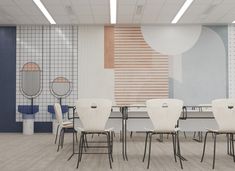 an empty conference room with white chairs and blue wall art on the walls, in front of a long table