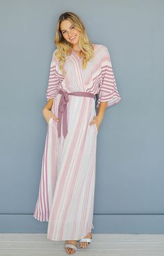 A new DM design that brings classic simplicity back! A perfect blend of playful & feminine in one design! Our Giselle offers a faux wrap design with contrast stripe details, a solid color waist tie, a Kimono sleeve with a ruffle edge & pockets! Perfect for maternity, & nursing mamas! Product Fit + Details: Maternity Fashion Dresses, Dm Design, Nursing Friendly, Fit Details, Striped Maxi, Maternity Nursing, Striped Maxi Dresses, Swimsuit Fashion, Kimono Sleeve