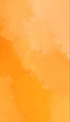 an orange and yellow background with some clouds