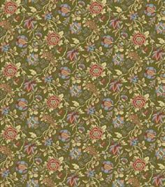 a green and red floral pattern on fabric