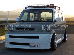 a white van parked on the side of a road