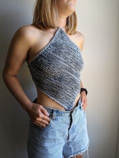 This top is crocheted with a mix of light grey merino wool and dark grey bamboo. The blend is very lightweight, breathable, structured, and flattering. It has an open back and adjustable straps.  Measurements (made for a size small or bust size of 34 in):  - Top to bottom: 19 in  - Pit to pit: 16.5 in If you like this top but want a custom size, send me a DM! Stretchy Gray Knit Top, Stretch Gray Knit Top, Gray Stretch Knit Top, Gray Open Knit Tops, Crochet Summer, Cropped Tube Top, Halter Crop Top, Summer Crochet, Tube Top