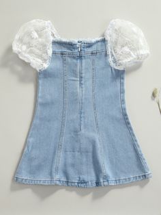 Grow with the flow with this unique toddler's denim dress ideal for warm weather! The adorable button-down design and pearl detailing add a little extra flair! Sensible for casual and dressy occasions Keeps its cuteness wash after wash Perfect for spring, summer, birthday parties, and year-round play Denim dress with faux front buttons, lace-capped sleeves, and zipper at the back. Includes dress in sizes 3T-7Y Toddler Denim Dress, Girls Denim Dress, Denim Cap, Lace Caps, Girls Denim, Diy Sewing Clothes, Denim Vest, Sewing Clothes, Warm Weather