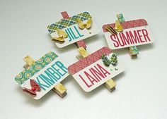 three pieces of paper that have been made to look like clothes pins with the words summer and lana printed on them