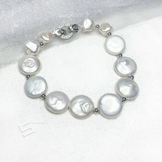 Biwa Coin Pearls In Silver Accents Bracelet , 13-14MM Pearls And Sterling Silver Clasp Bracelet, Bridal Pearl Bracelet, Bridalmaids Gift Adjustable Mother Of Pearl Oyster Bracelet, Adjustable Oyster Pearl Bracelet, Pearl White Oyster Bracelet, Elegant Silver Mother Of Pearl Bracelet, White Oyster Bracelet, Silver Pearl Chain Bracelet, Silver Pearl Drop Bracelet With Round Shape, Adjustable Mother Of Pearl Bracelets For Weddings, Adjustable Mother Of Pearl Wedding Bracelets