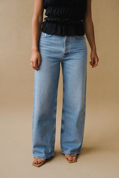 Agolde wide leg, low slung baggy in light indigo void wash. Ultra-relaxed. This upsized fit sits low on the hips with a directional, baggy silhouette. Cut with a full length inseam and crafted in non-stretch denim with subtle drape. Button fly. Rise 12.5", inseam 30.5", leg opening 21". Model is 5'10" wearing a size 27. 100% organic cotton. Made in Turkey with imported materials. PIPE AND ROW Autumn 2023, Silhouette Cut, Wide Leg Denim, Individual Style, Winter Style, Everyday Outfits, Stretch Denim, The Row, Winter Fashion