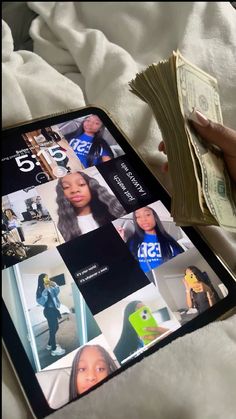 a person is holding a cell phone with pictures on the screen and money in their hand