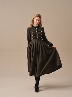 Winter Wool Dresses With Buttons, Green Winter Dress With Button Closure, Wool Buttoned Workwear Dresses, Winter Workwear Midi Dress With Ruffles, Vintage Knee-length Midi Dress For Winter, Vintage Winter Dresses With Buttons, Vintage Formal Winter Midi Dress, Formal Vintage Dress With Buttons For Fall, Vintage Buttoned Midi Dress For Fall