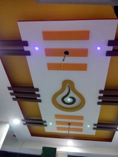 the ceiling is decorated with different colors and designs