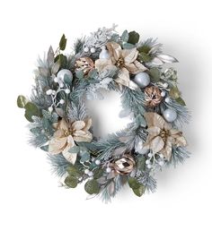 a christmas wreath with silver and gold decorations