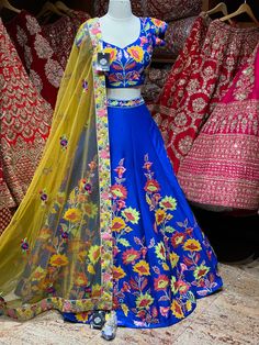 Royal blue summer blossom pattern with colorful flowers hand embroidered patchwork design lehenga. Available with matching embroidered blouse and contrasting light yellow embroidered net dupatta. All you need to slay that perfect look and this is how! Fabric : Silk Size: 38/M Ready to Ship! Bollywood Style Multicolor Sets With Intricate Embroidery, Multicolor Embroidered Lehenga For Designer Wear, Designer Multicolor Lehenga With Intricate Embroidery, Designer Multicolor Embroidered Lehenga, Fitted Sharara With Multicolor Floral Embroidery, Multicolor Designer Sets With Intricate Embroidery, Multicolor Embroidered Designer Sets, Anarkali Lehenga With Intricate Embroidery In Multicolor, Anarkali Multicolor Lehenga With Intricate Embroidery